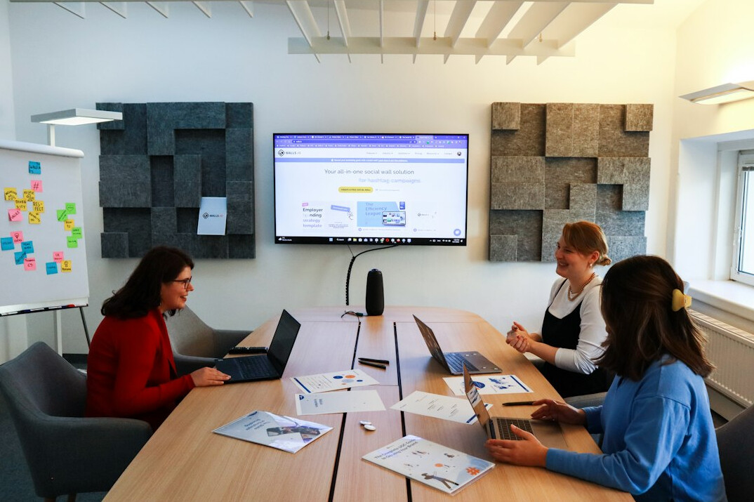 team of developers in meeting room